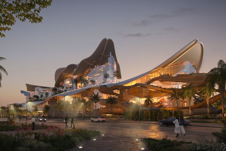 Therme Singapore: Rendered evening shot directed to the outdoor slides in the Play area coming from the MRT subway stop.